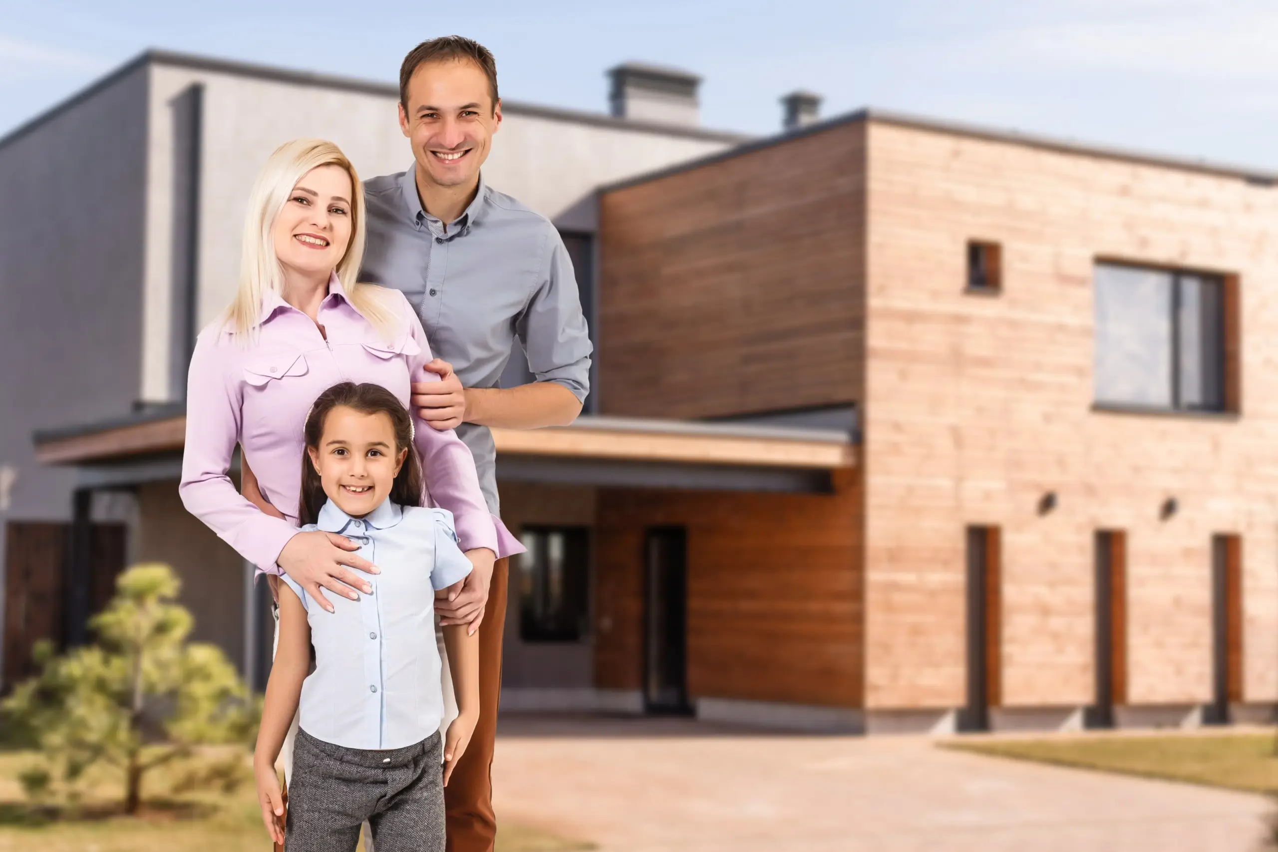 happy-family-near-new-house-real-estate-concept-min